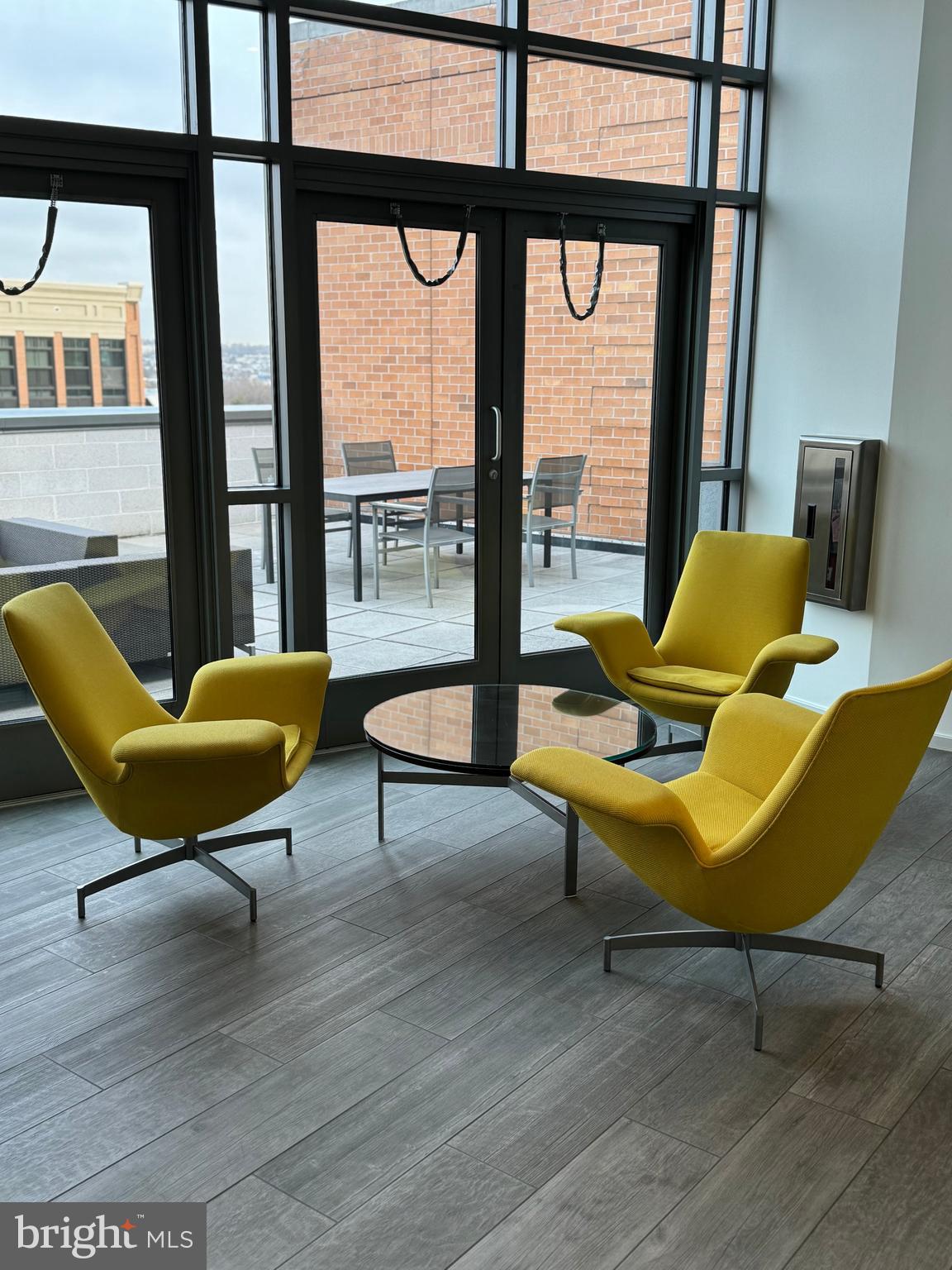 460 New York Avenue Northwest, Unit 407 Washington, DC 20001 - Photo 17 of 64 a living room with a couch and a large window