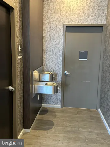 a view of room and wooden floor