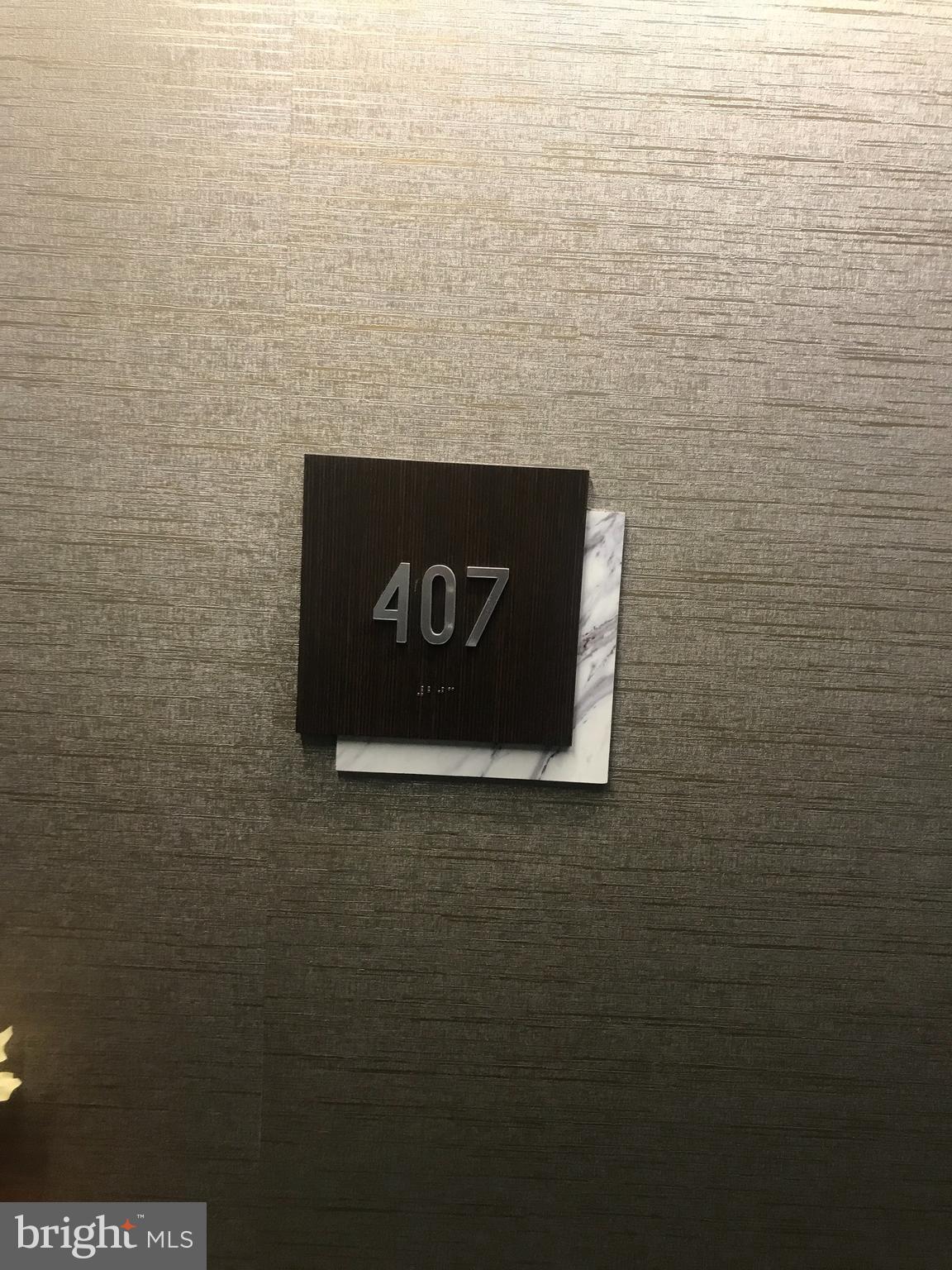 460 New York Avenue Northwest, Unit 407 Washington, DC 20001 - Photo 30 of 64 a sign on the side of a bathroom