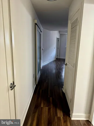 a close view of a utility room with dryer and washer