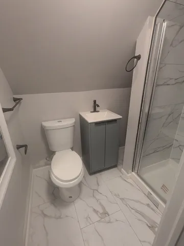 a bathroom with a sink and toilet