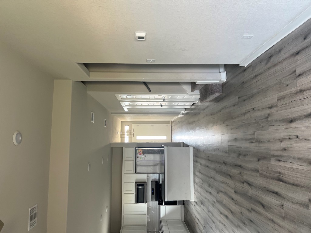 160 Coppers Way Elgin, TX 78621 - Photo 4 of 4 a view of a kitchen with a sink and a stove top oven