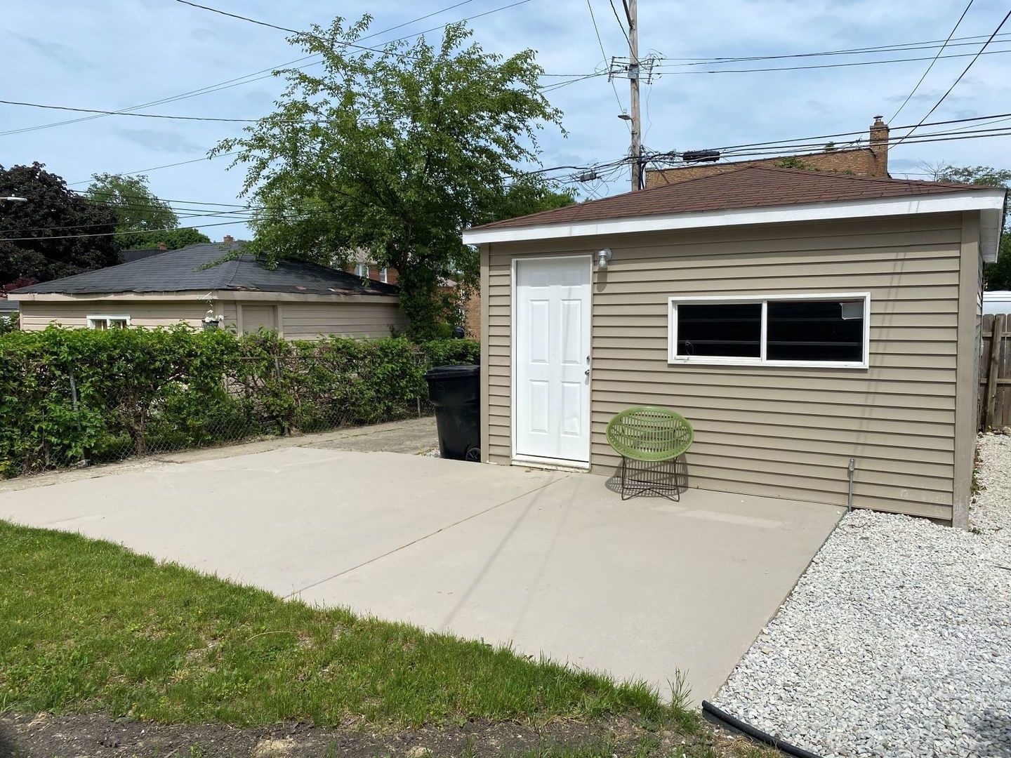 9405 South Laflin Street Chicago, IL 60620 - Photo 24 of 24 a backyard of a house with plants and lake view