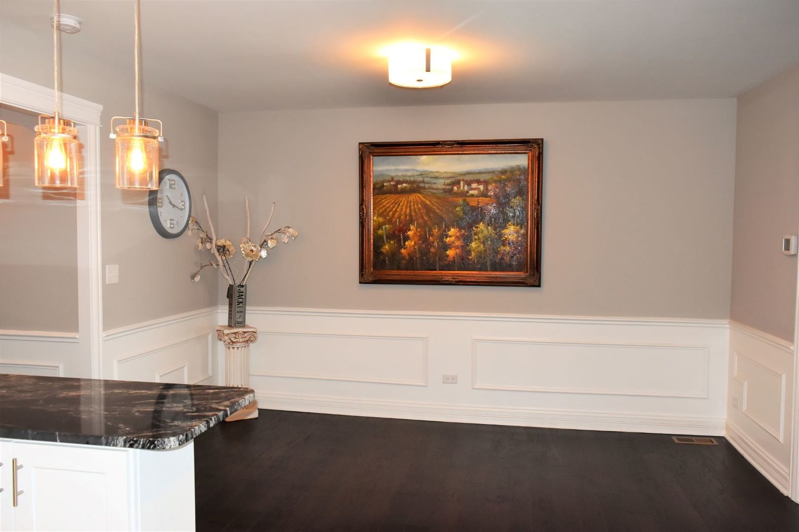 9405 South Laflin Street Chicago, IL 60620 - Photo 5 of 24 a view of a room with wooden floor and windows