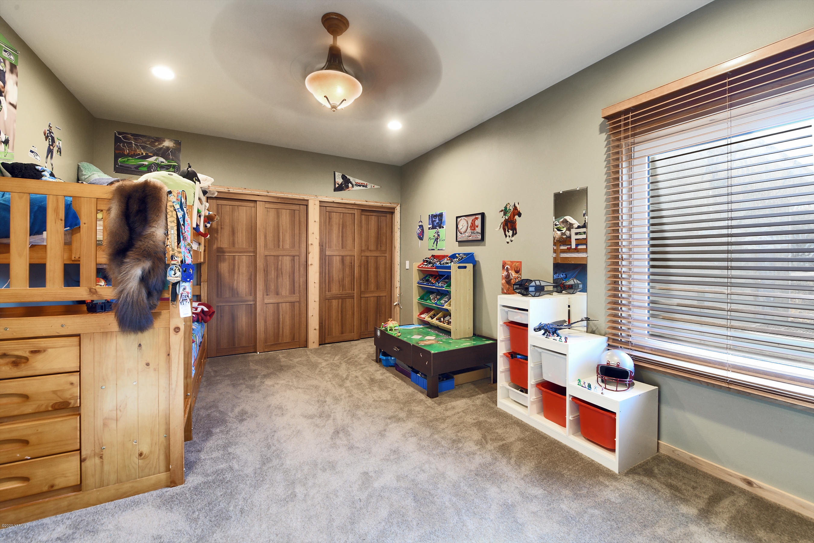 451 Black Hawk Road Yakima, WA 98908 - Photo 15 of 27 a room with lots of white furniture a lamp and a window