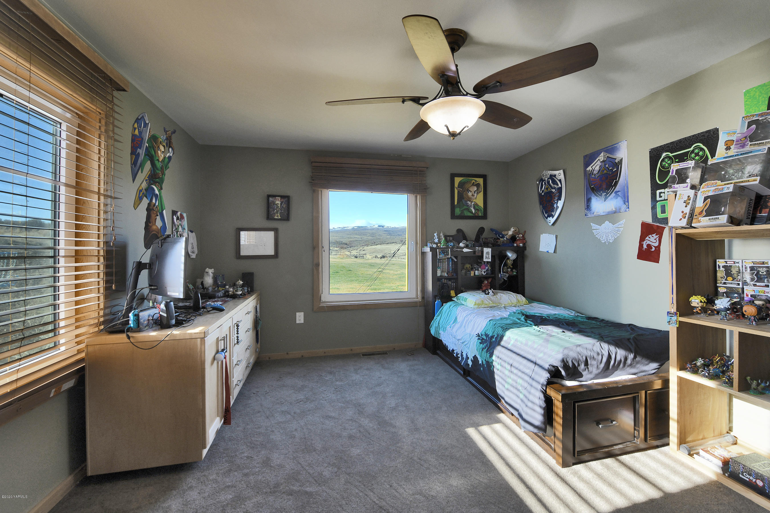 451 Black Hawk Road Yakima, WA 98908 - Photo 16 of 27 a bed room with furniture and a window
