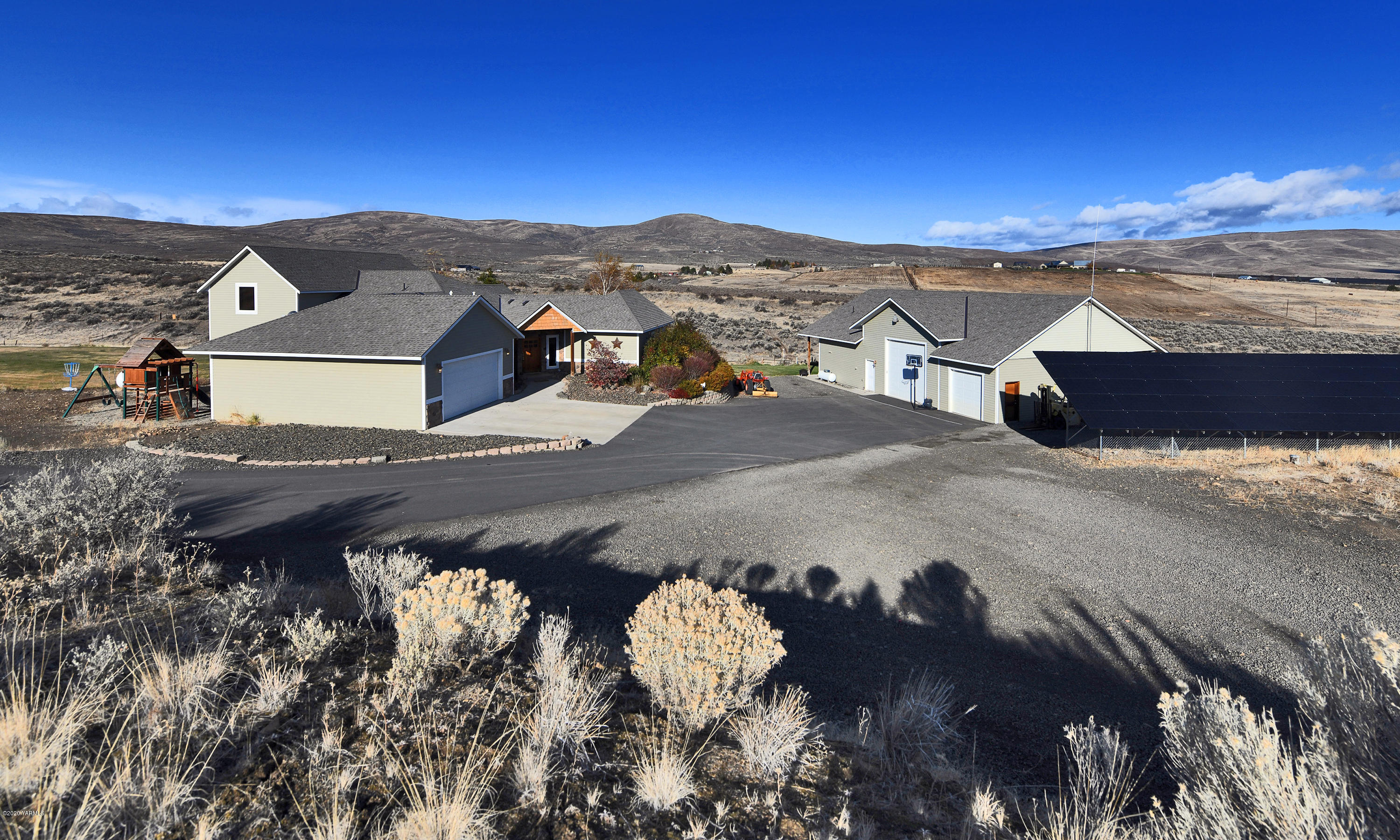 451 Black Hawk Road Yakima, WA 98908 - Photo 27 of 27 a view of a house with a yard