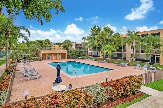 a swimming pool view with a outdoor space