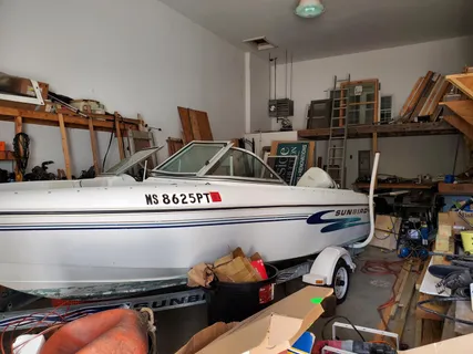 a utility room with dryer washer and other items