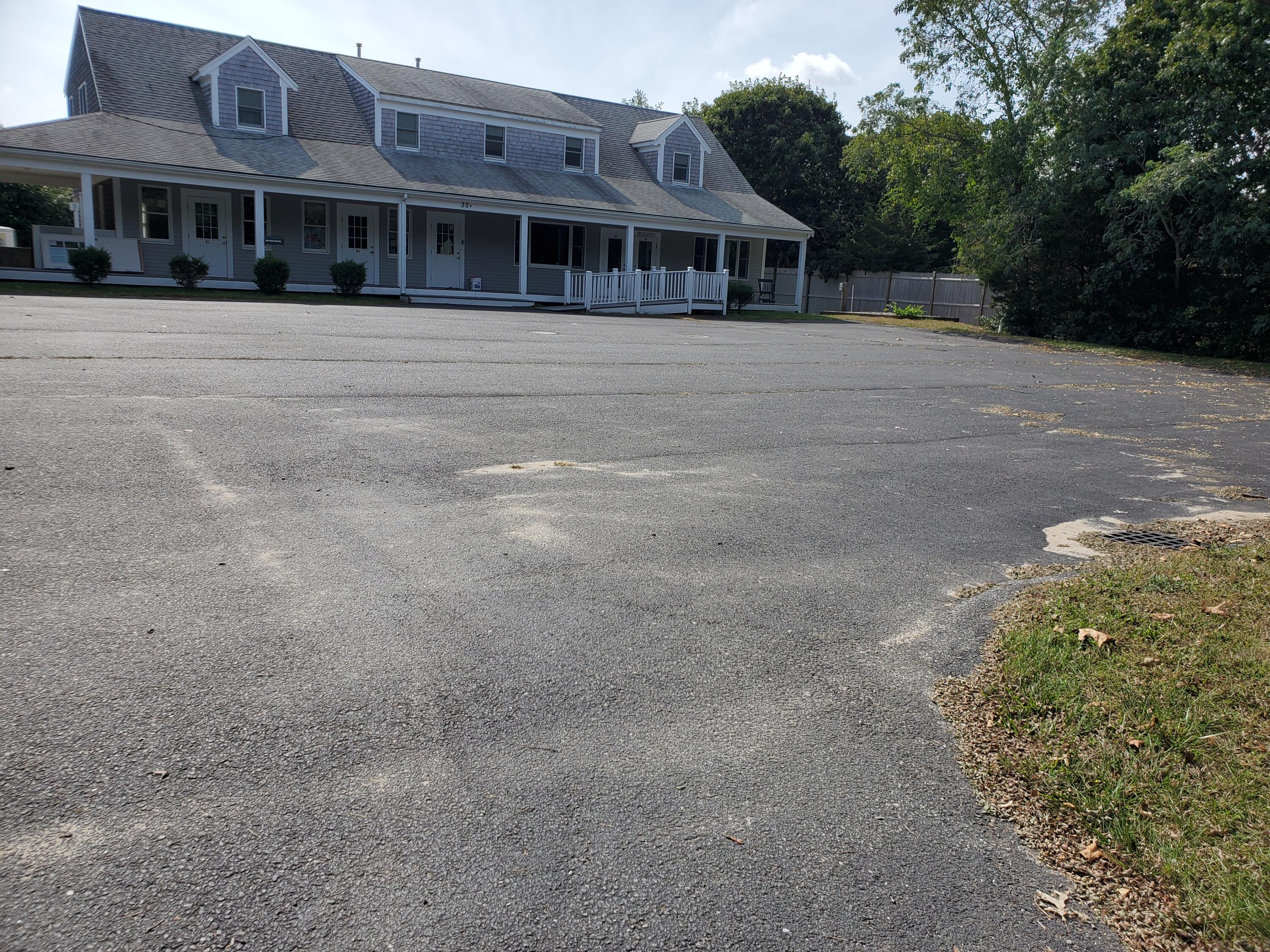 35 Brittany's Way Eastham, MA 02642 - Photo 22 of 30 a front view of a house with a yard