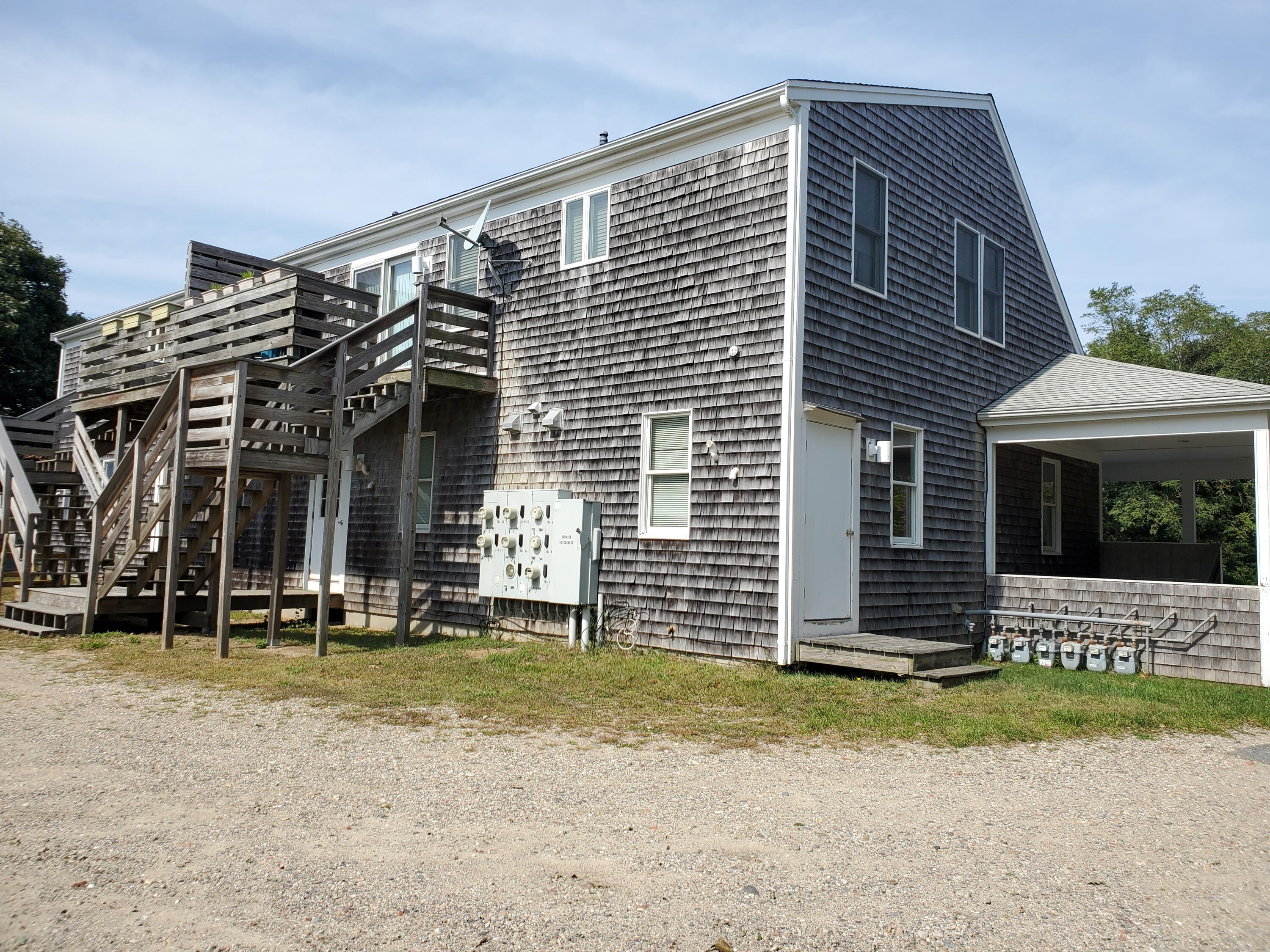 35 Brittany's Way Eastham, MA 02642 - Photo 25 of 30 a front view of a house