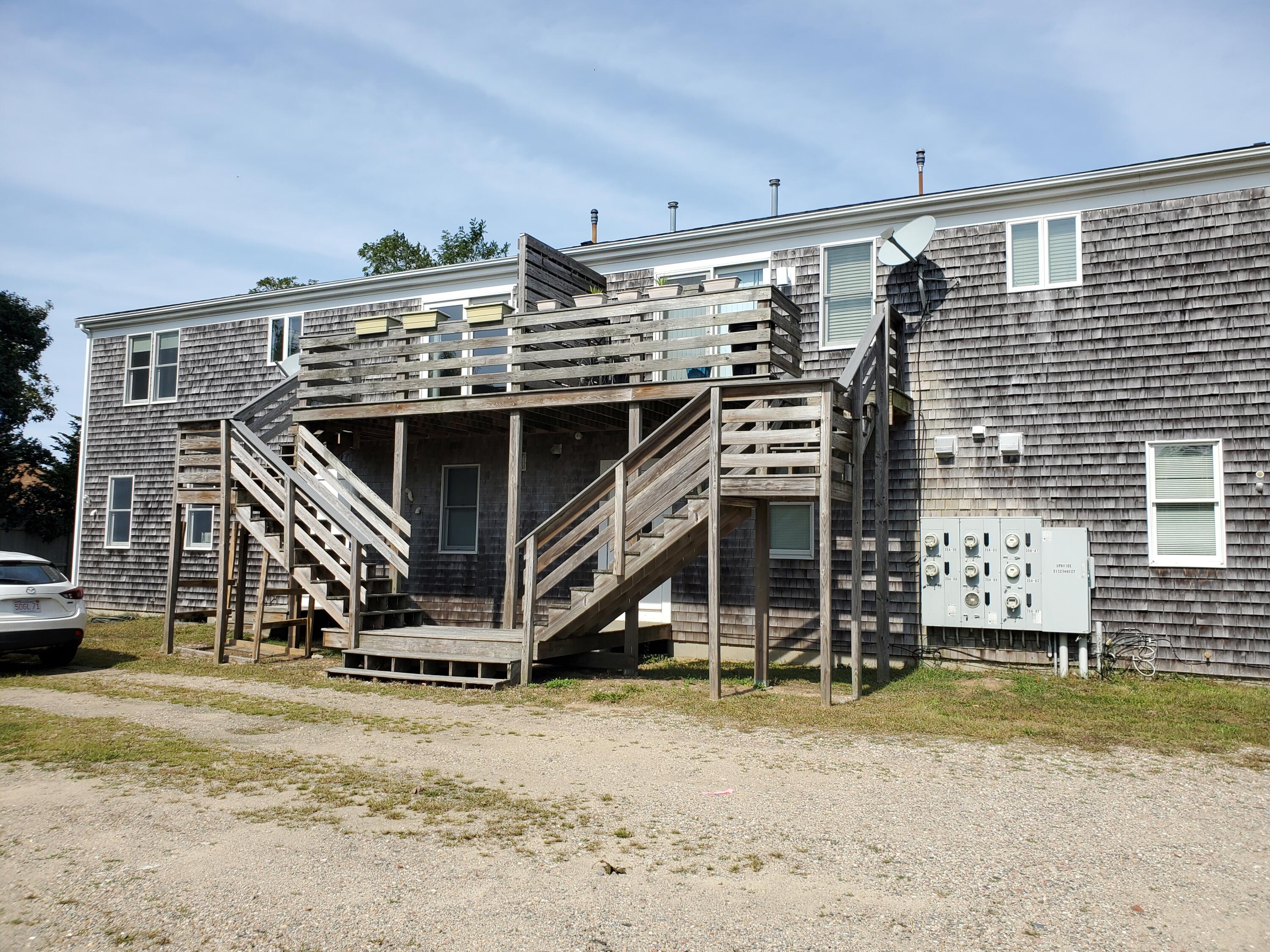 35 Brittany's Way Eastham, MA 02642 - Photo 28 of 30 a front view of a house with a yard