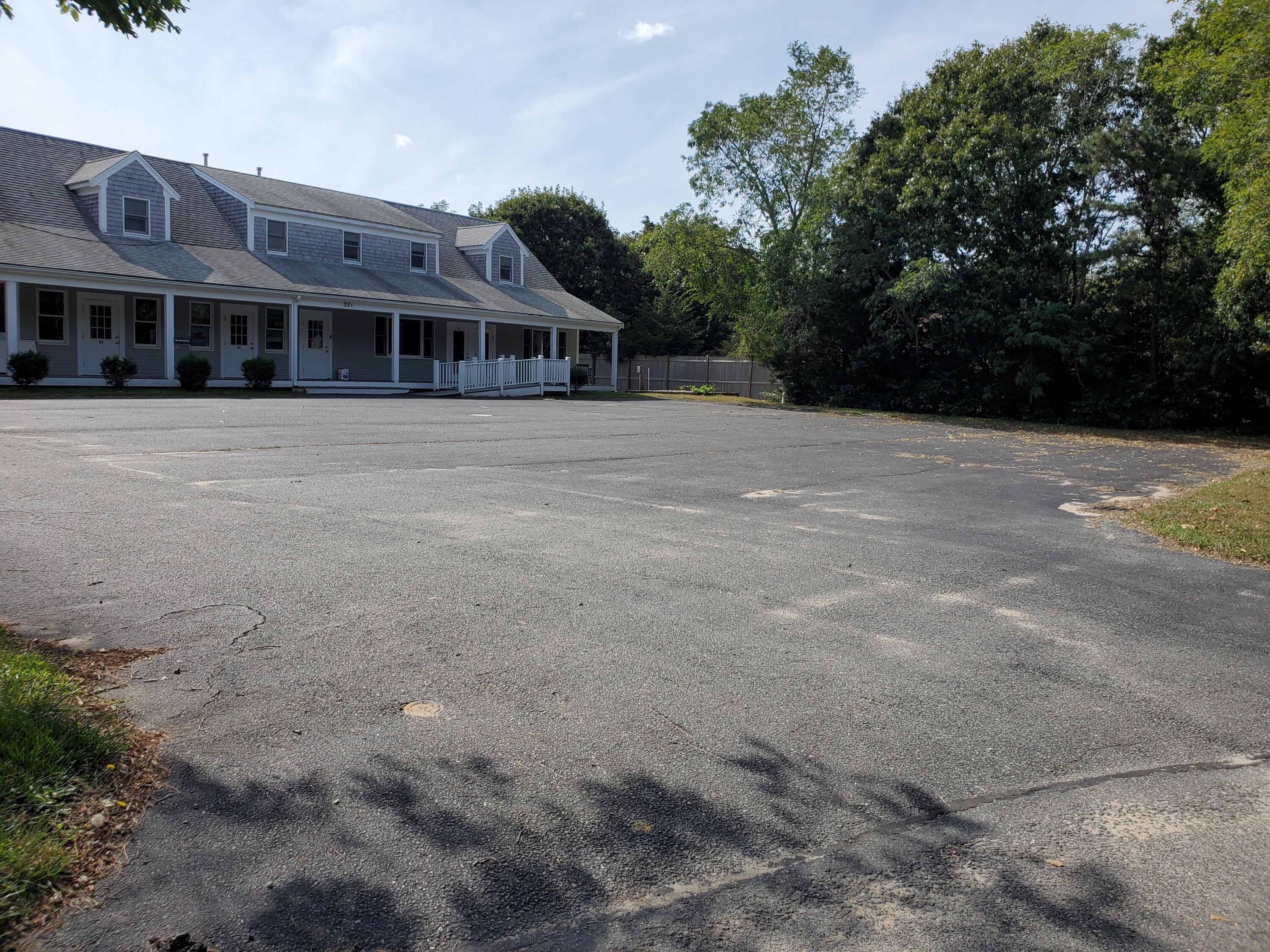 35 Brittany's Way Eastham, MA 02642 - Photo 30 of 30 a front view of a house with a yard