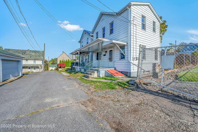 a childrens park with lots of swings and slides