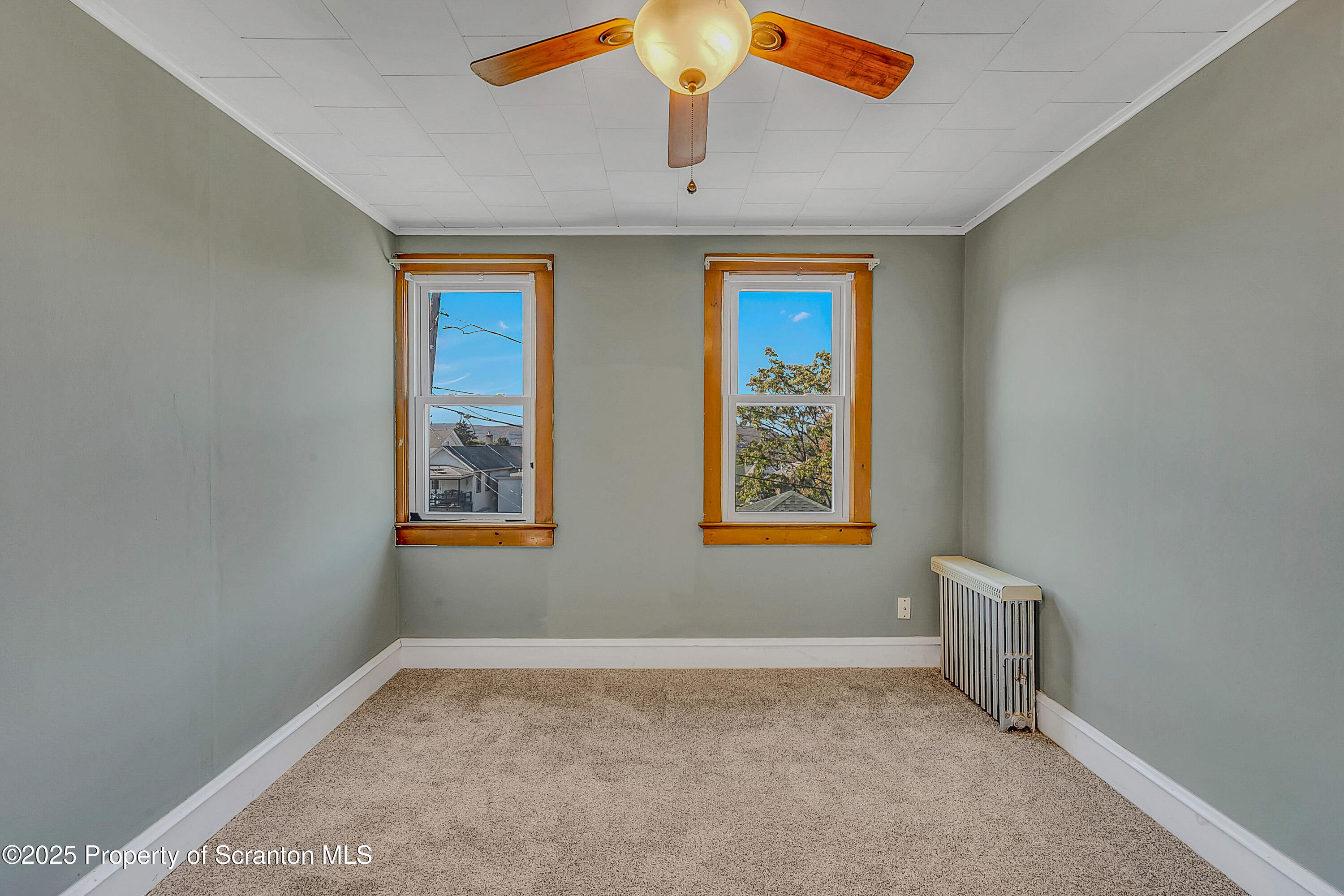1202 North Webster Avenue, Unit REAR Dunmore, PA 18510 - Photo 2 of 21 an empty room with windows