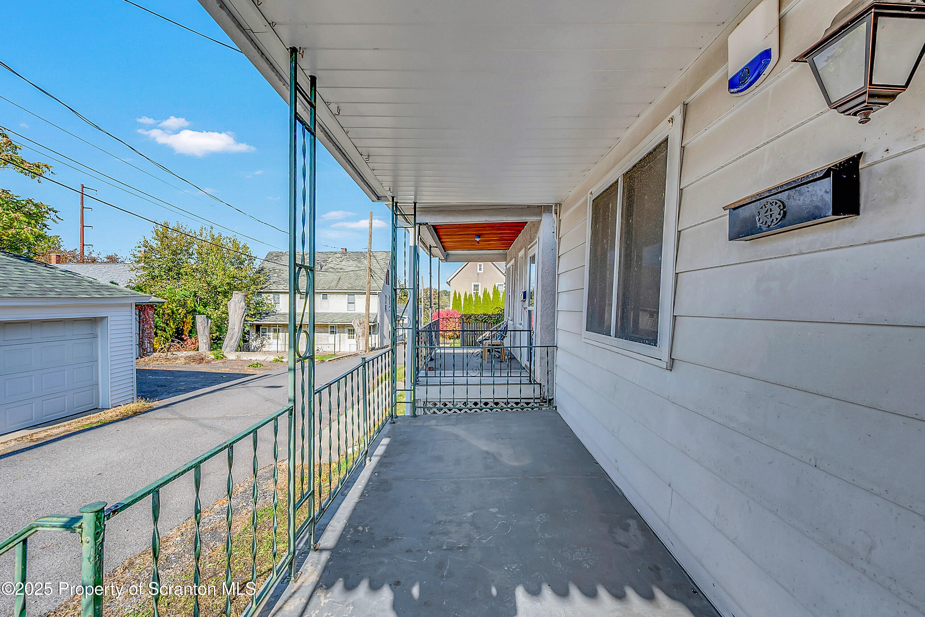 1202 North Webster Avenue, Unit REAR Dunmore, PA 18510 - Photo 9 of 21 a view of a house with balcony