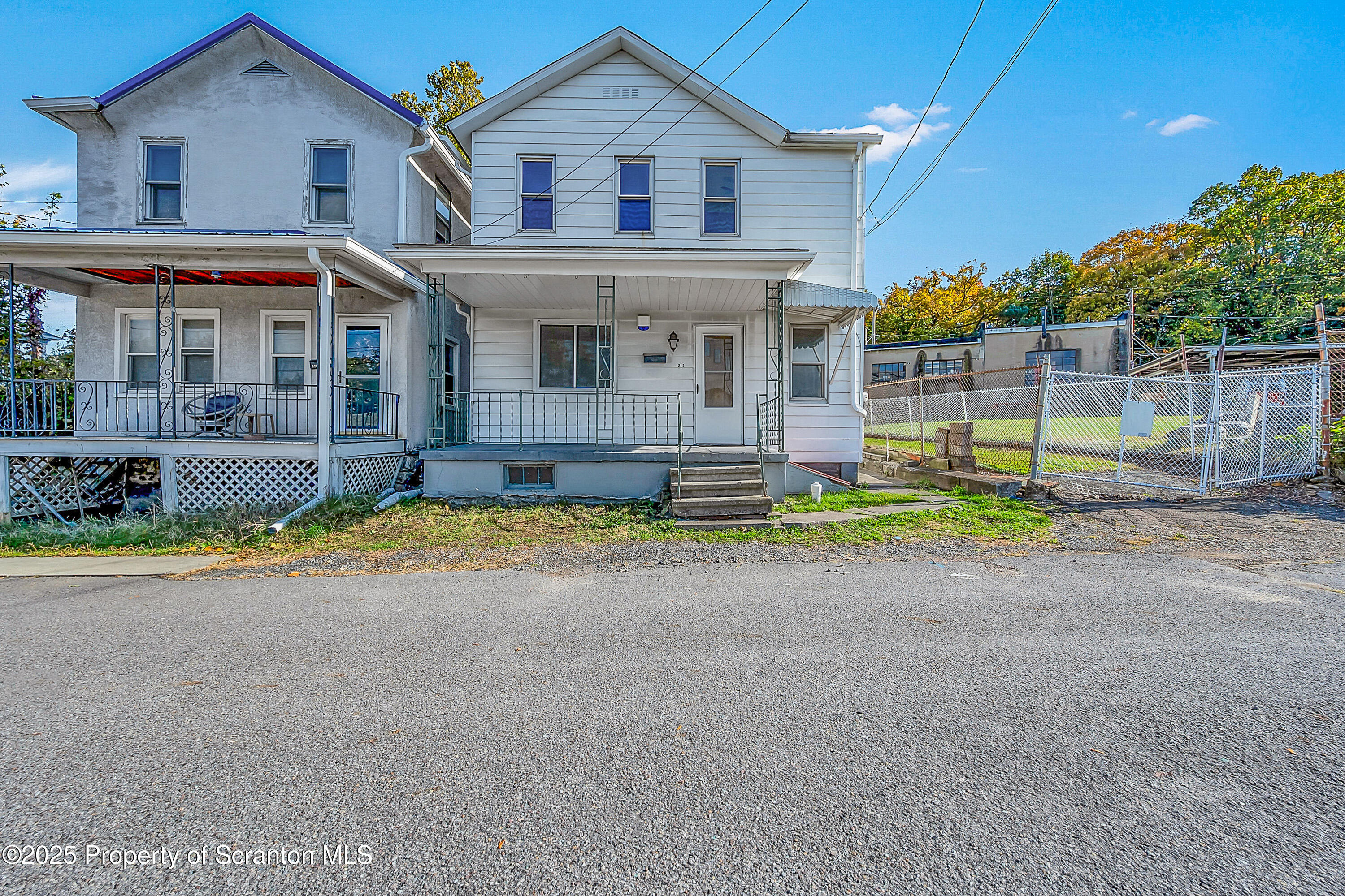 1202 North Webster Avenue, Unit REAR Dunmore, PA 18510 - Photo 10 of 21 front view of a house with a yard
