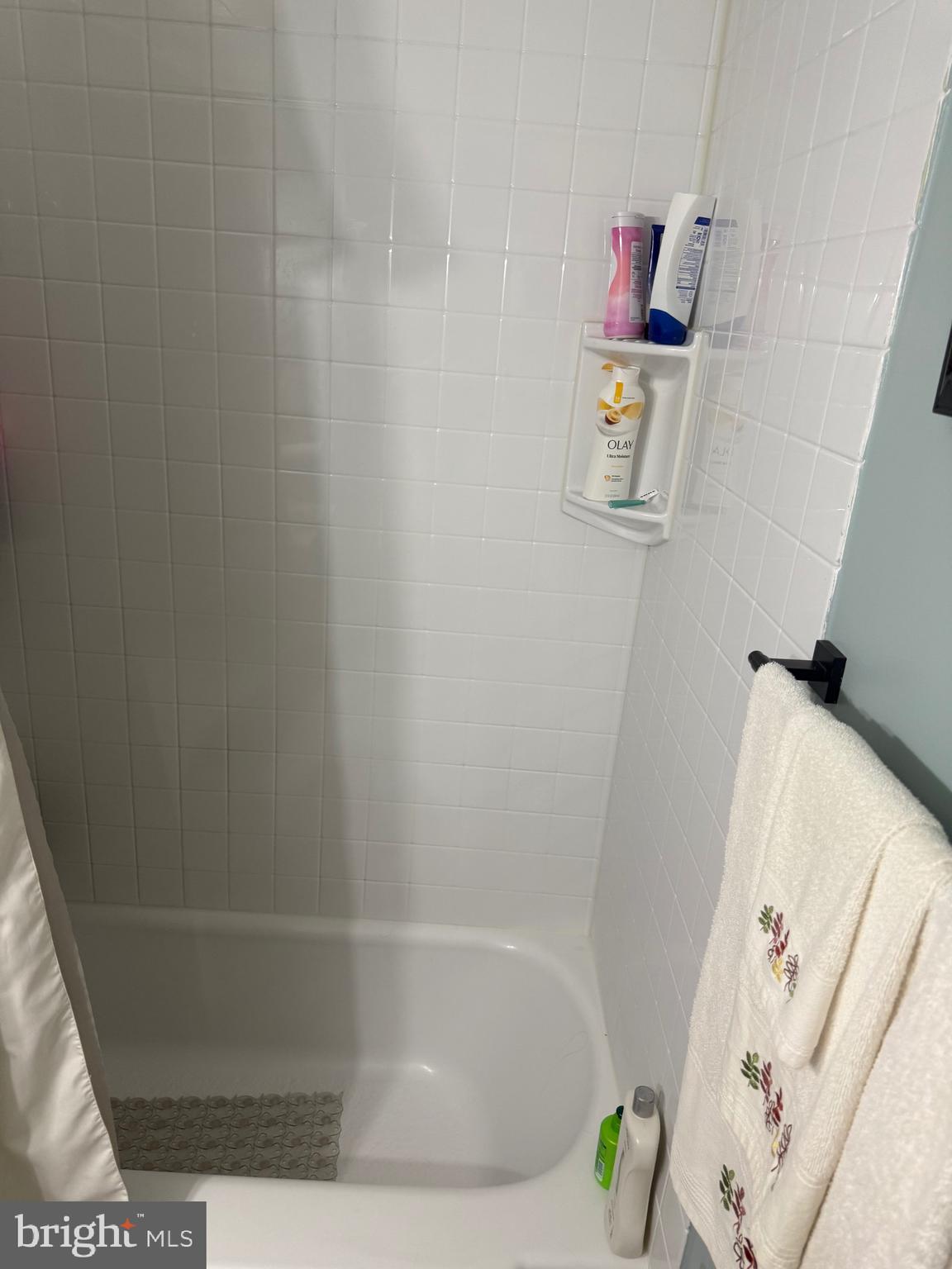 1346 Willow Road Baltimore, MD 21222 - Photo 54 of 81 a bath tub sitting next to a white sink and vanity