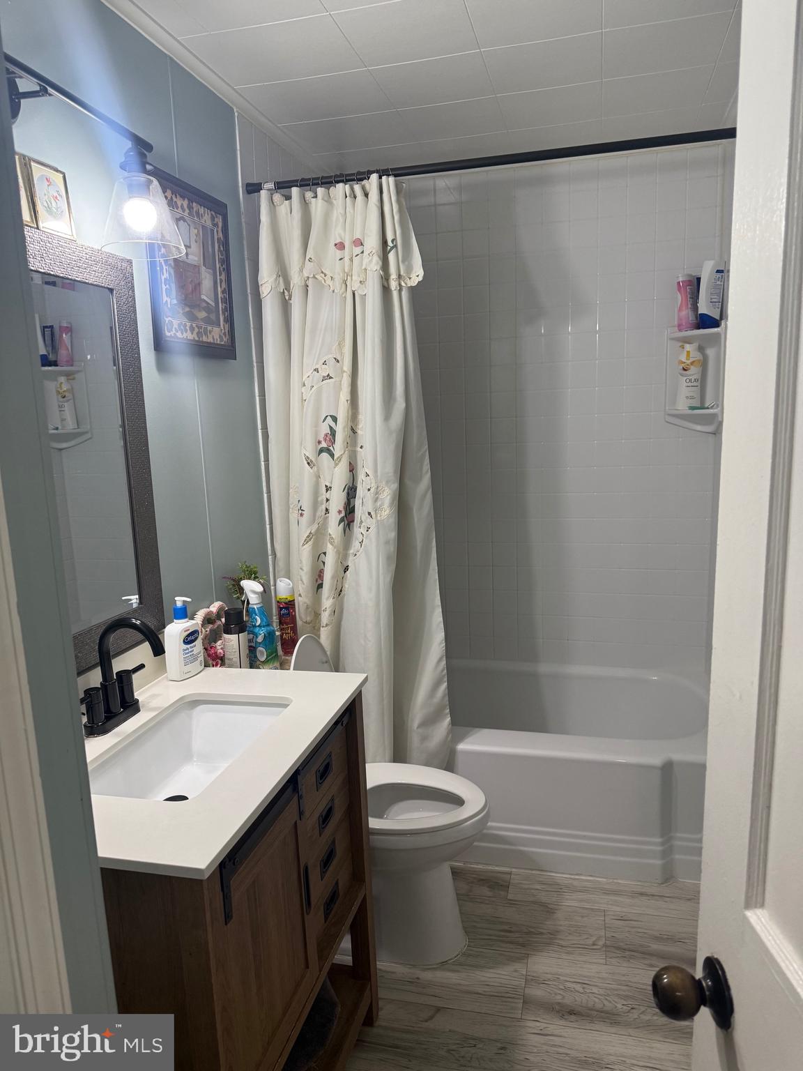 1346 Willow Road Baltimore, MD 21222 - Photo 56 of 81 a bathroom with a sink a toilet and shower