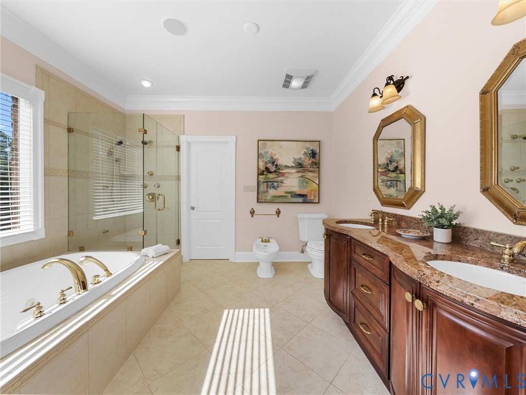 13612 Waterswatch Court Midlothian, VA 23113 - Photo 59 of 88 a spacious bathroom with a granite countertop tub double vanity and a mirror