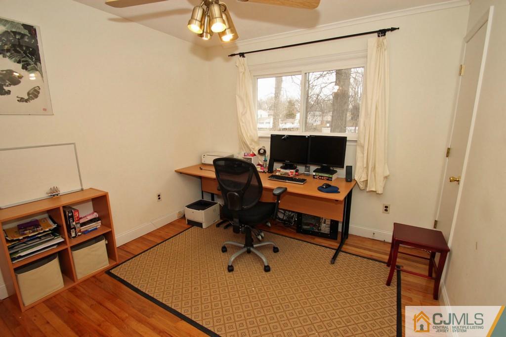 32 Timber Road Edison, NJ 08820 - Photo 17 of 25 a view of a workspace with furniture and a window