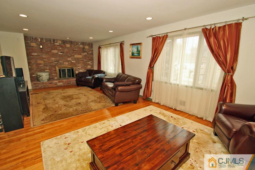 32 Timber Road Edison, NJ 08820 - Photo 3 of 25 a living room with furniture and a large window