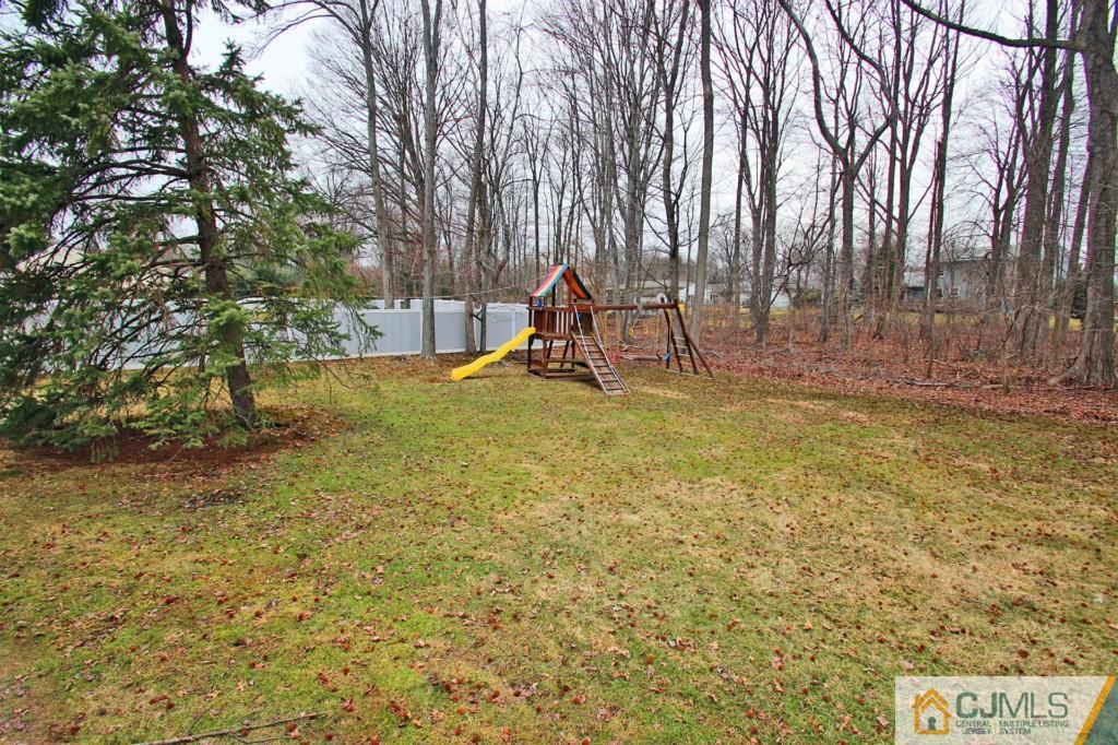 32 Timber Road Edison, NJ 08820 - Photo 25 of 25 a view of a yard with a slide