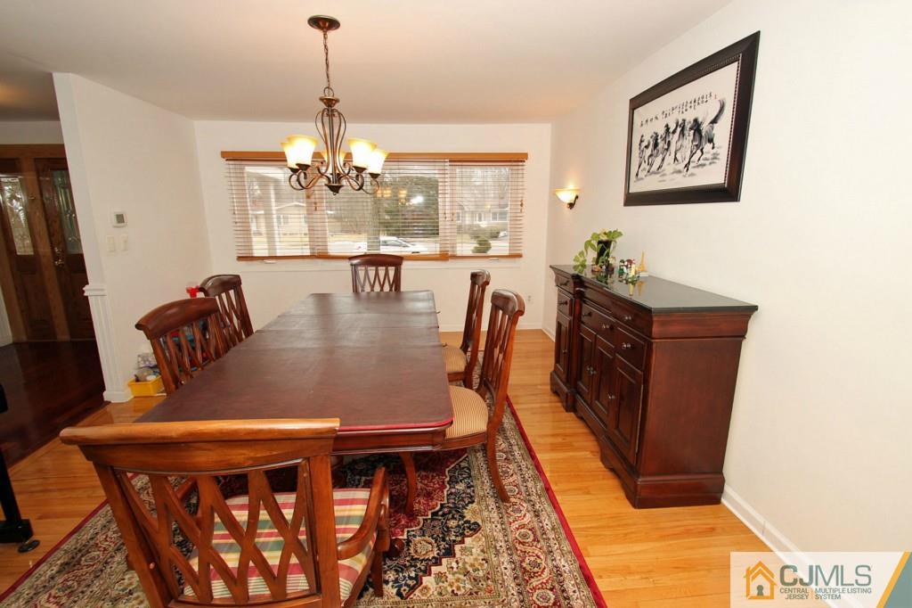 32 Timber Road Edison, NJ 08820 - Photo 5 of 25 a dining room with furniture and window