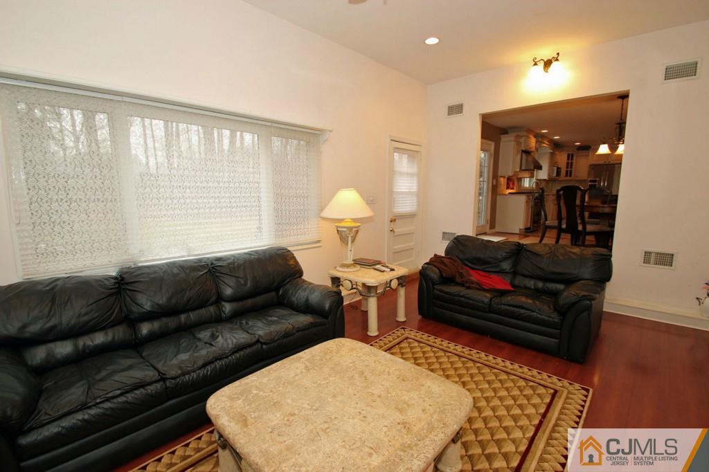 32 Timber Road Edison, NJ 08820 - Photo 8 of 25 a living room with furniture and a window
