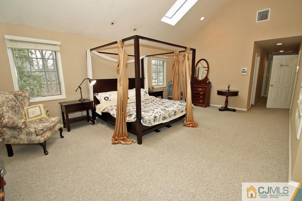 32 Timber Road Edison, NJ 08820 - Photo 10 of 25 a bedroom with furniture and a window