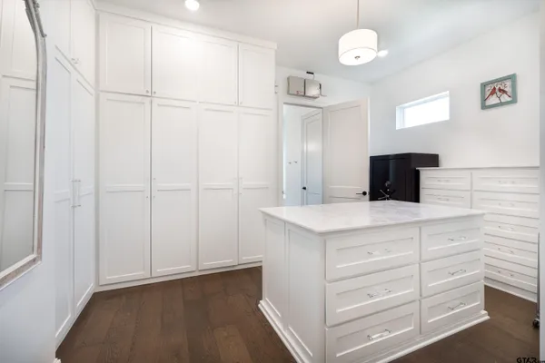 a kitchen that has a sink and a stove