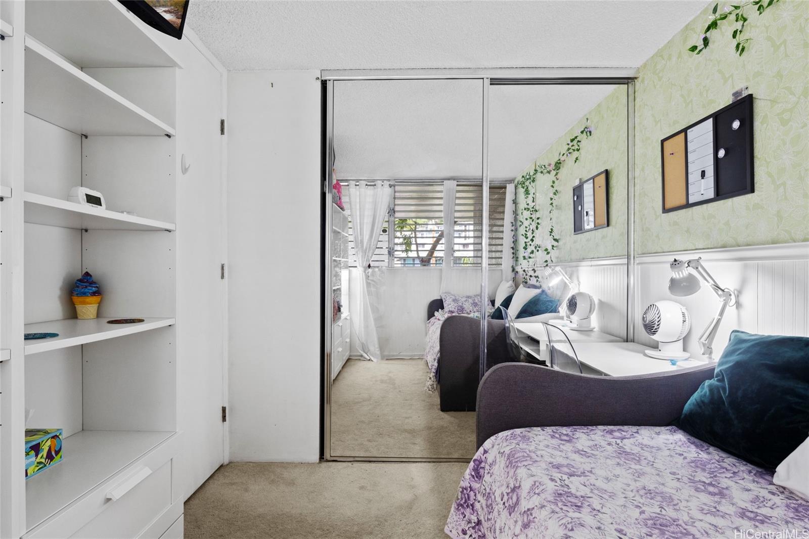 965 Prospect Street, Unit 404 Honolulu, HI 96822 - Photo 8 of 24 a living room with furniture and a window