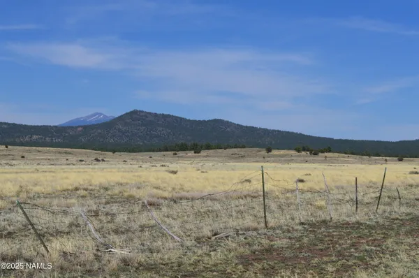 a view of an outdoor space and mountain view