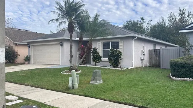a house view with a garden space
