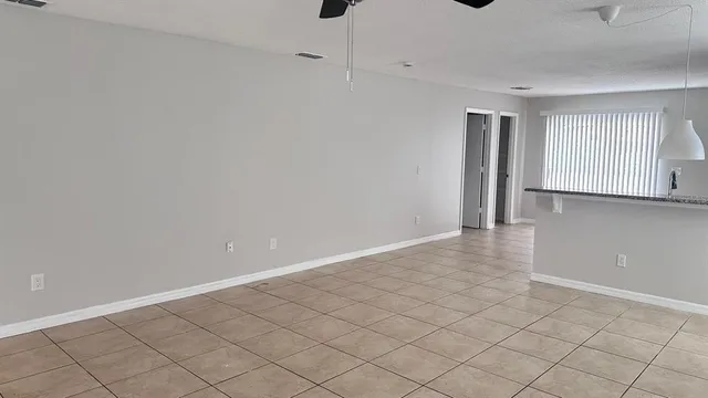 a view of an empty room and window