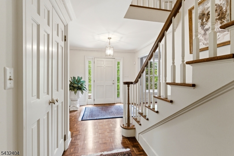 13 Hamden Road Flemington, NJ 08822 - Photo 8 of 37 a view of staircase with lots of frames on wall and a chandelier