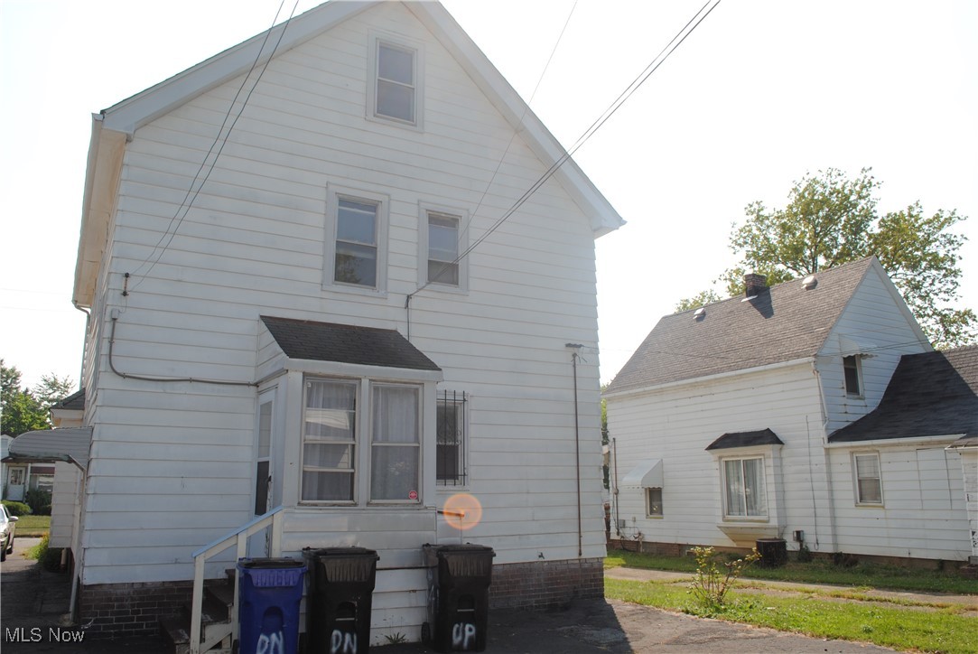 841 Whitcomb Road Cleveland, OH 44110 - Photo 6 of 30 Rear view of house