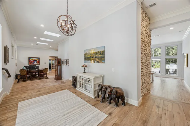 a kitchen with lots of clutter and cabinets