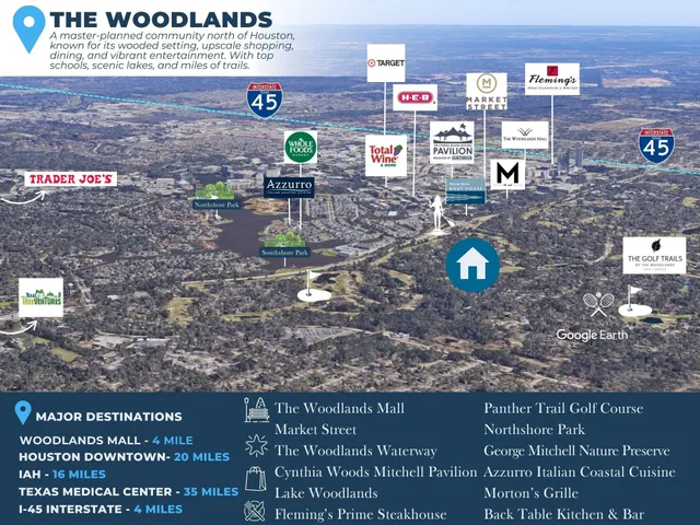 a spacious bedroom with a large bed and chandelier