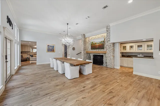 a bedroom with furniture and a flat screen tv