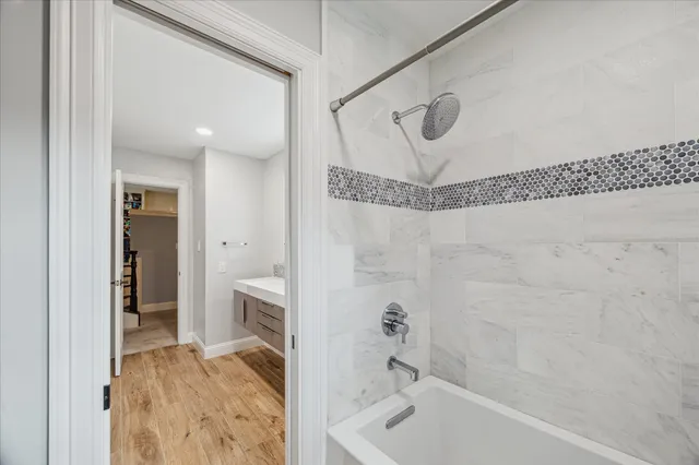 a view of a house with sitting area and garden