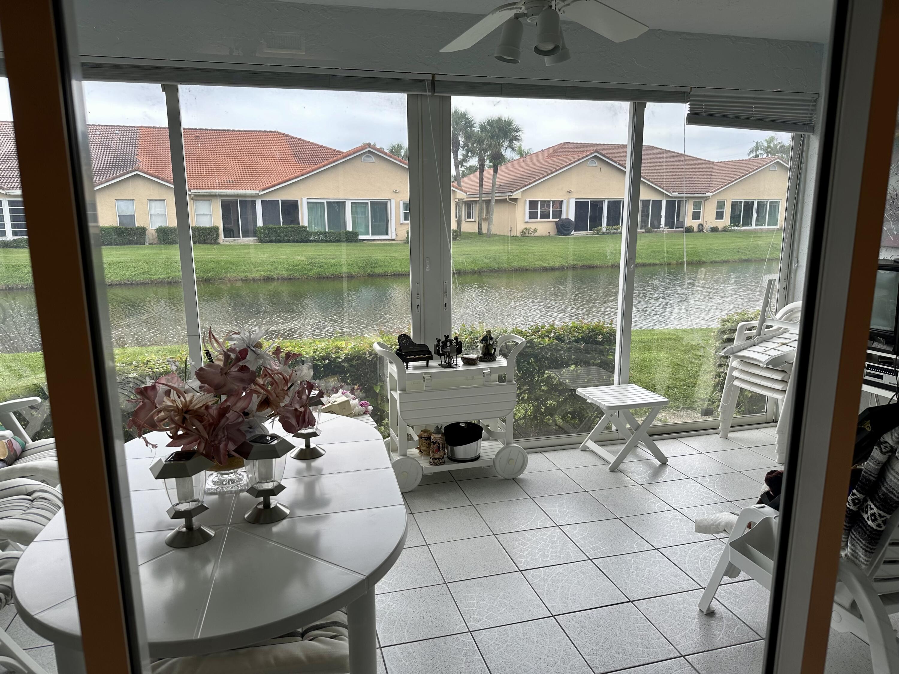 10940 Ladera Lane, Unit C Boca Raton, FL 33498 - Photo 21 of 26 Screened Patio