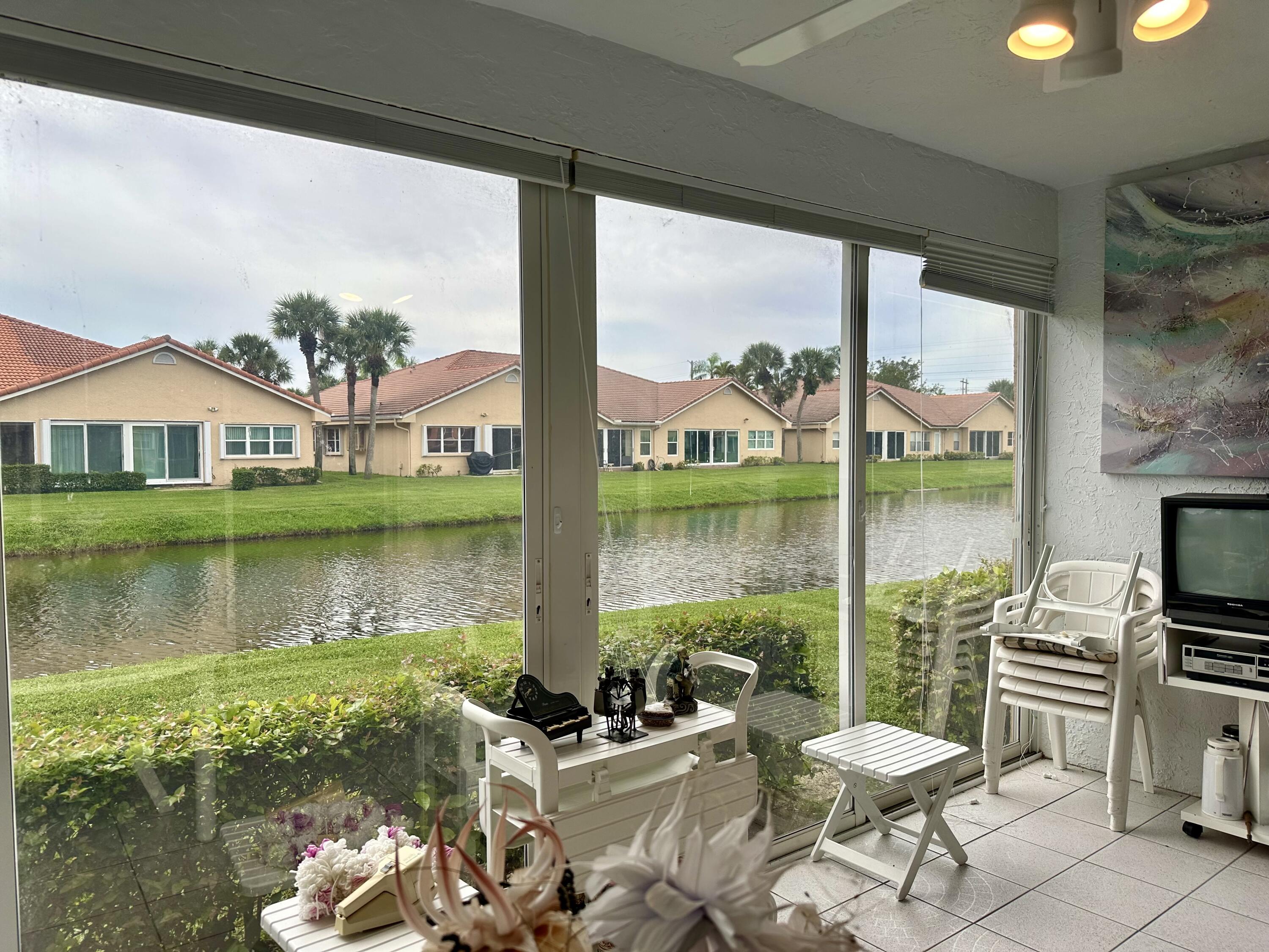 10940 Ladera Lane, Unit C Boca Raton, FL 33498 - Photo 23 of 26 Screened Patio