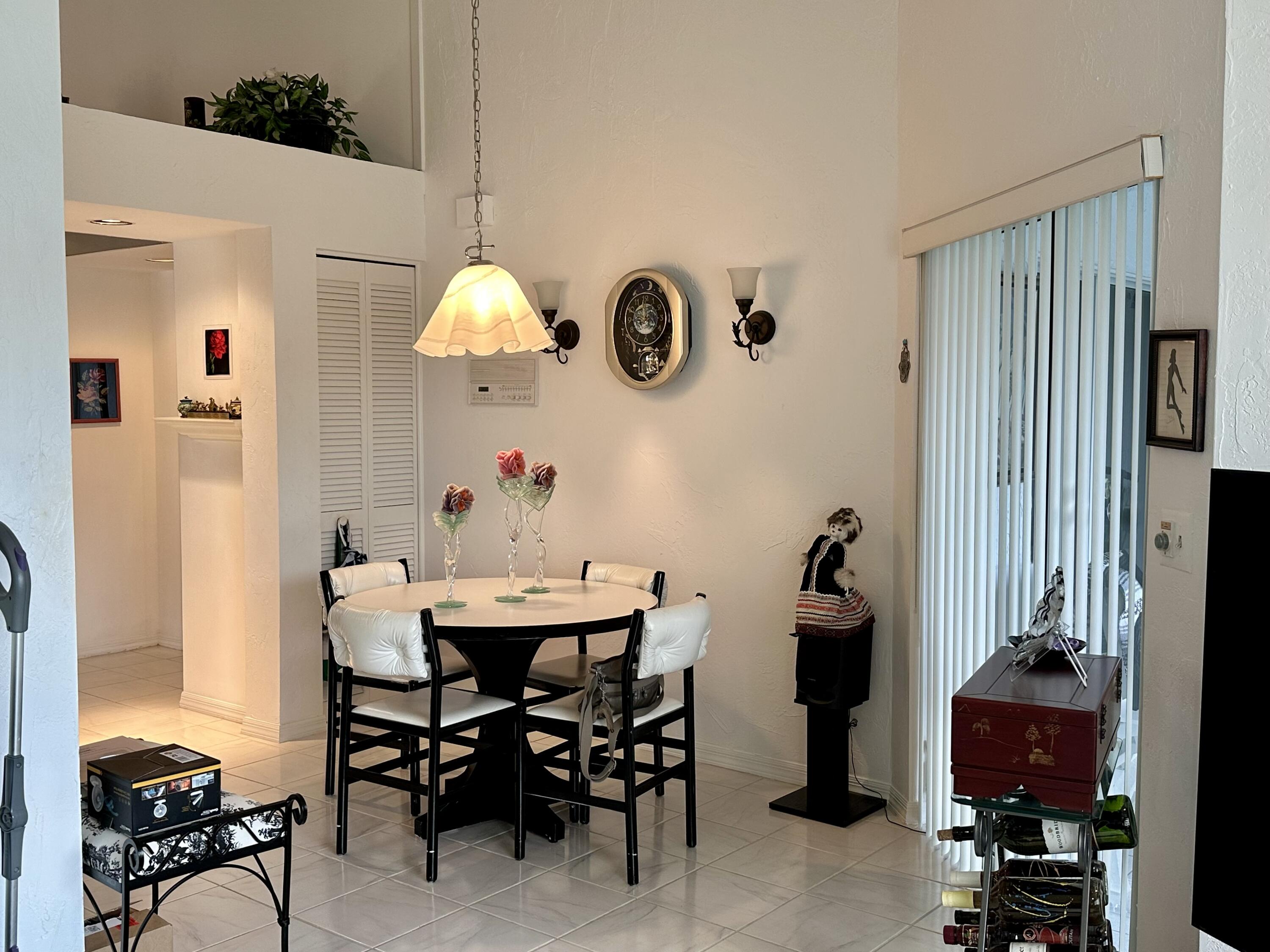 10940 Ladera Lane, Unit C Boca Raton, FL 33498 - Photo 8 of 26 Kitchen Dining Area