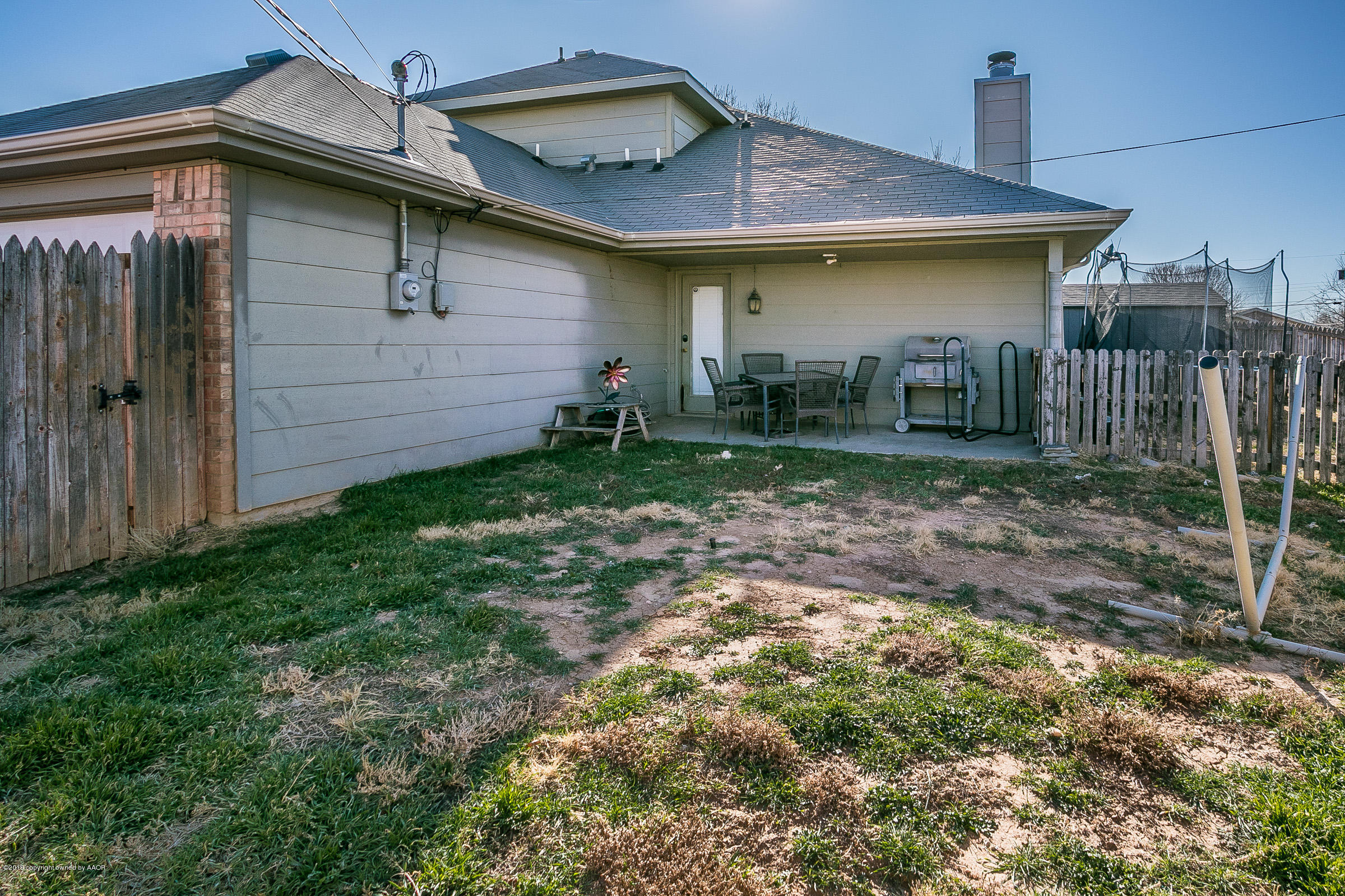 1168 Rushmore Drive Amarillo, TX 79110 - Photo 23 of 25 a view of a backyard with plants