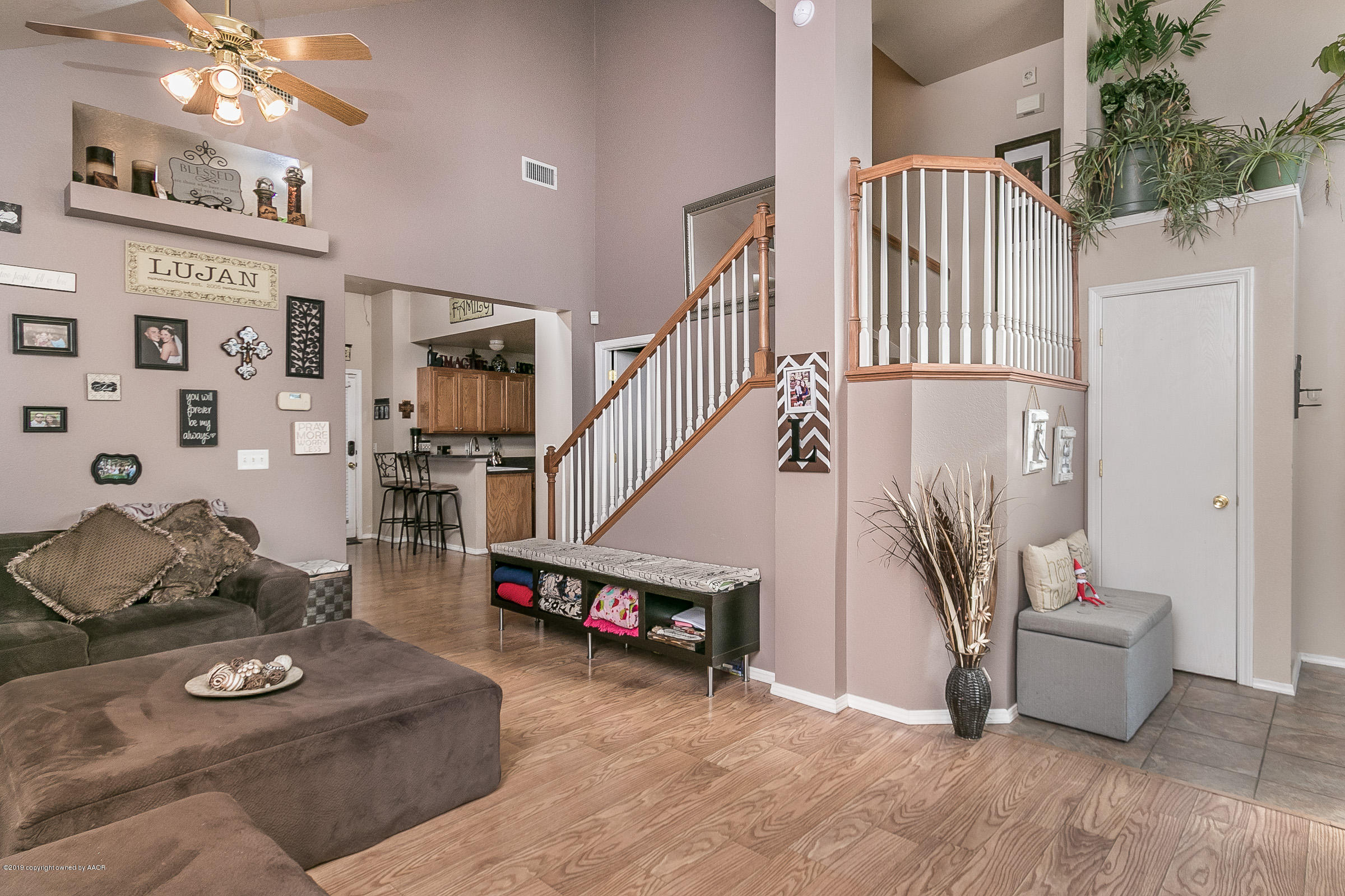 1168 Rushmore Drive Amarillo, TX 79110 - Photo 4 of 25 a living room with furniture and stairs