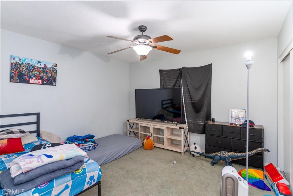 81901 Victoria Street Indio, CA 92201 - Photo 20 of 29 a bedroom with a bed and furniture