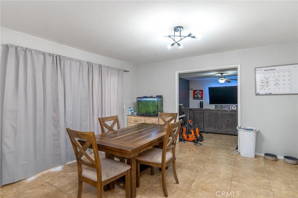 81901 Victoria Street Indio, CA 92201 - Photo 10 of 29 a dining room with furniture and window