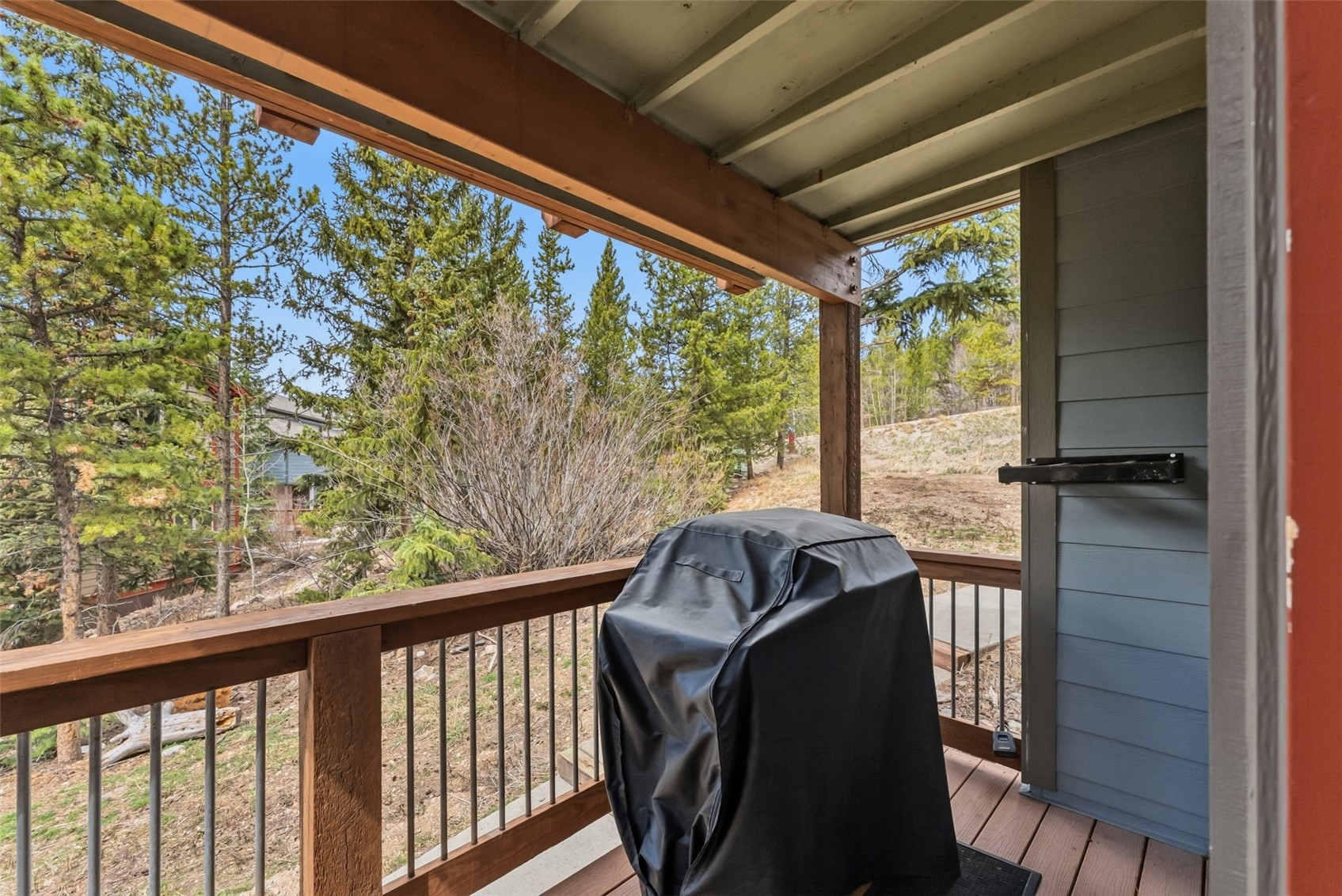 78 Bunker Hill Lode Road, Unit 3 Breckenridge, CO 80424 - Photo 29 of 31 Front covered deck with grill