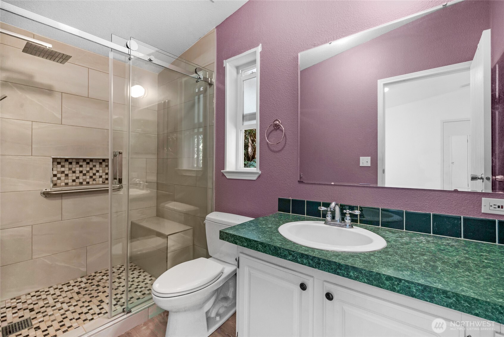 22222 49th Avenue Southeast Bothell, WA 98021 - Photo 12 of 37 a bathroom with a sink toilet and shower